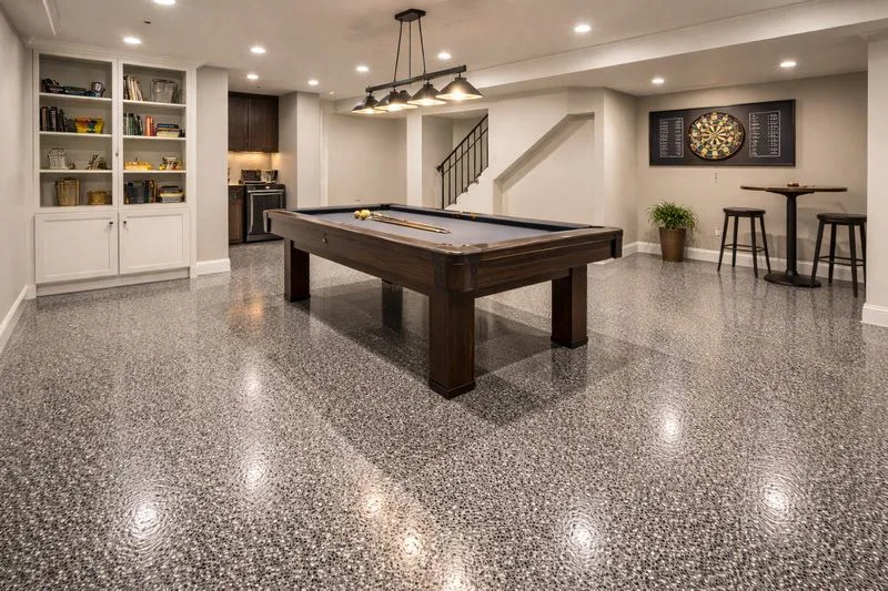Rec room charcoal flake epoxy floor by the Ascent Epoxy team